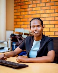 Dr. Christine K UMUMARARUNGU.